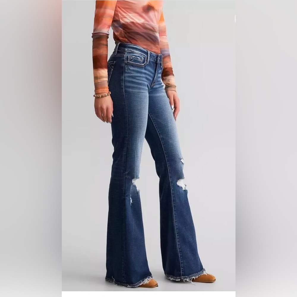 Buckle Dark Blue Flare Jeans with Distressed Knees